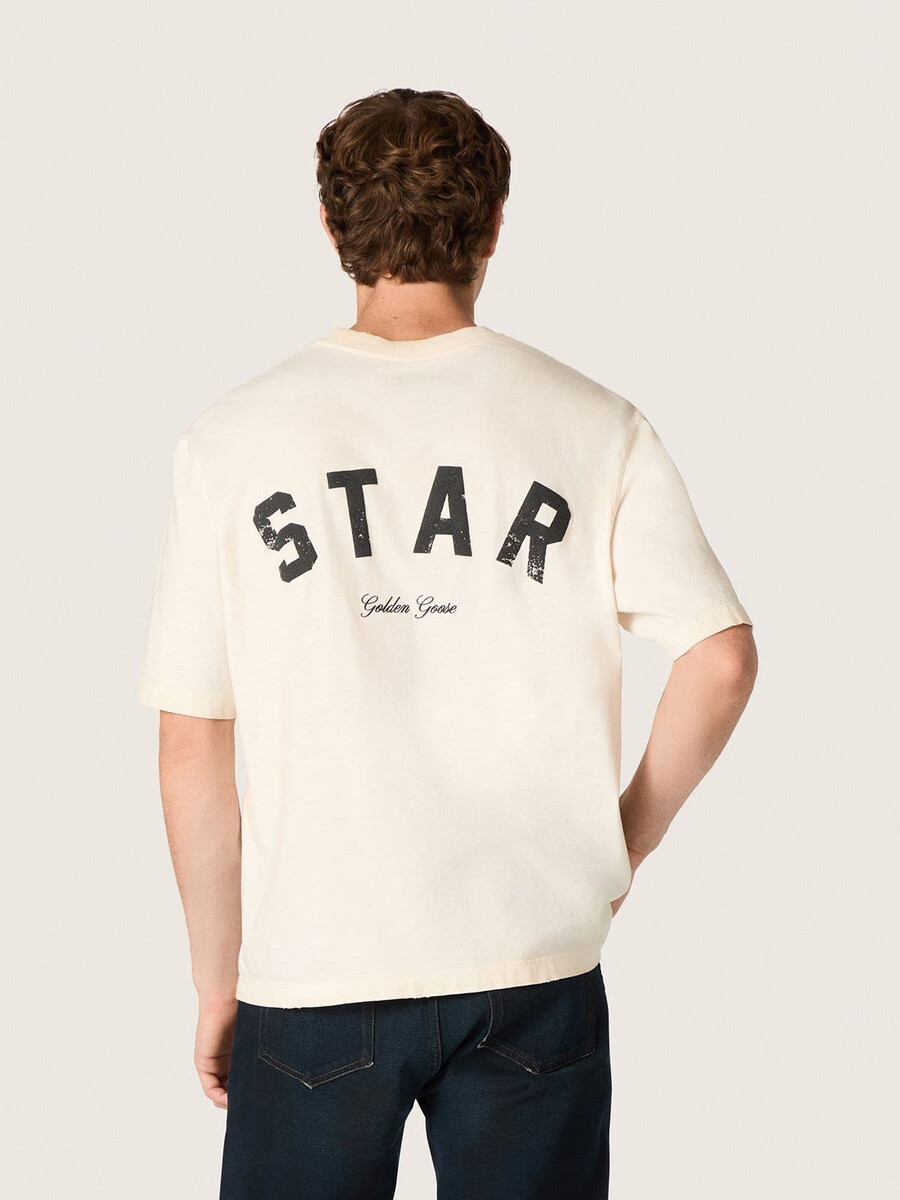 unisex bombažna majica z zvezdico v vintage beli barvi s črnim potiskom na hrbtu