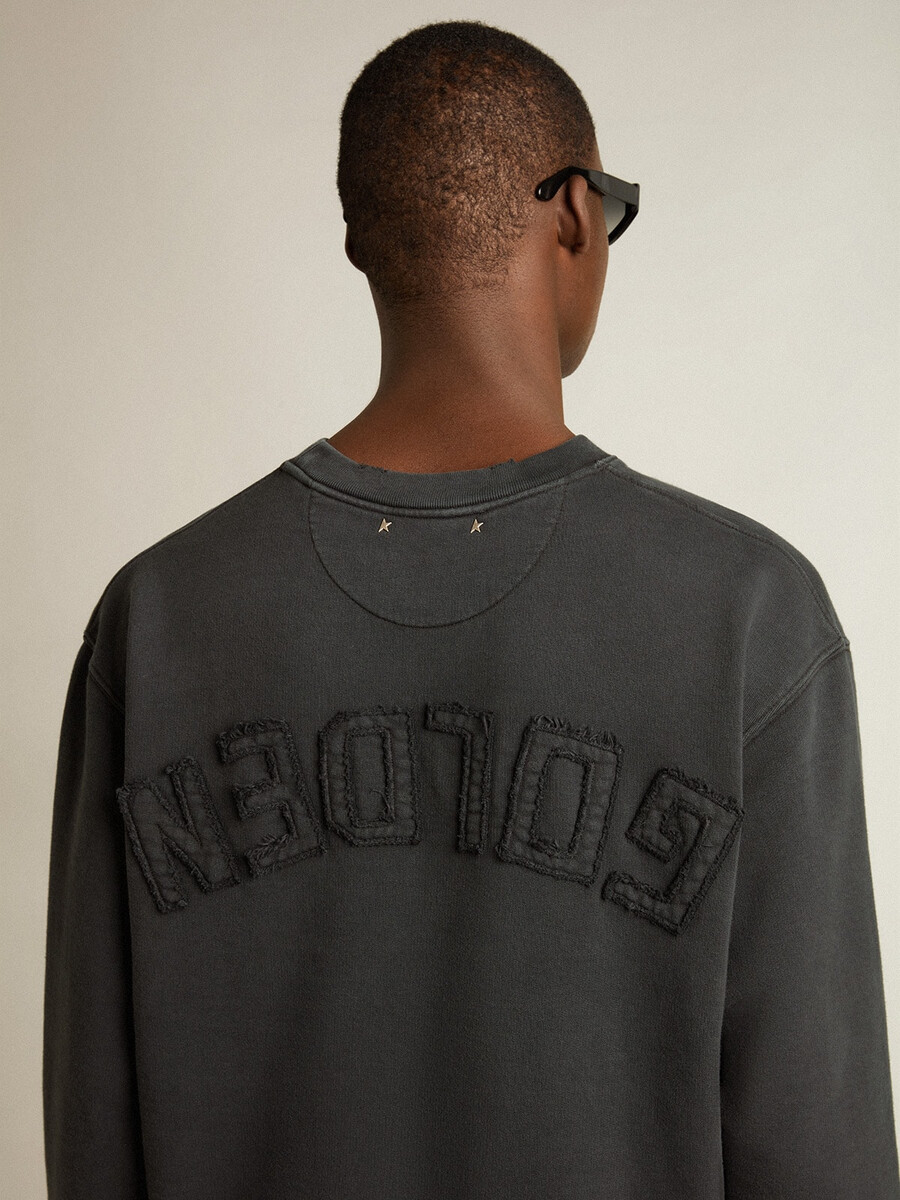 pulover v oprani črni barvi z logotipom na hrbtni strani - jersey capsule